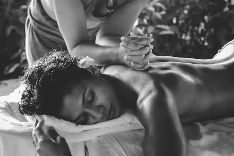 Dispensing warm Thai massage oil